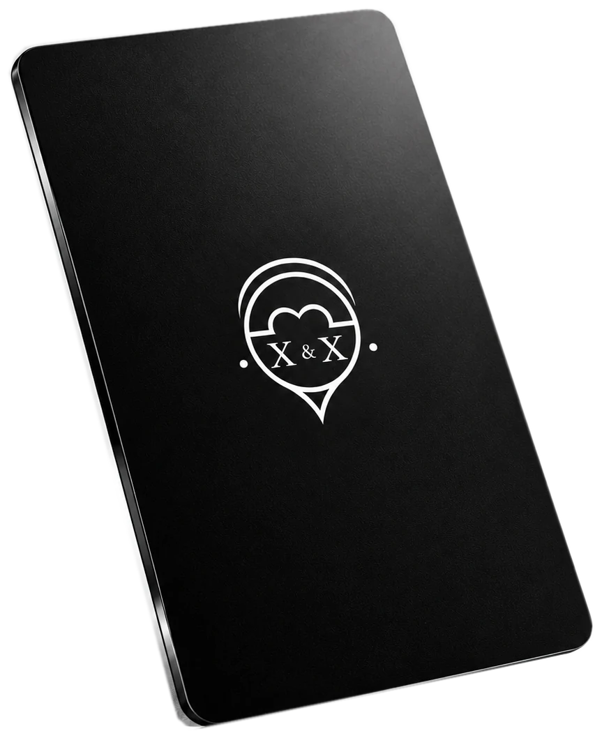 X&X Tap Card — matte black portrait NFC card with the small white X&X emblem